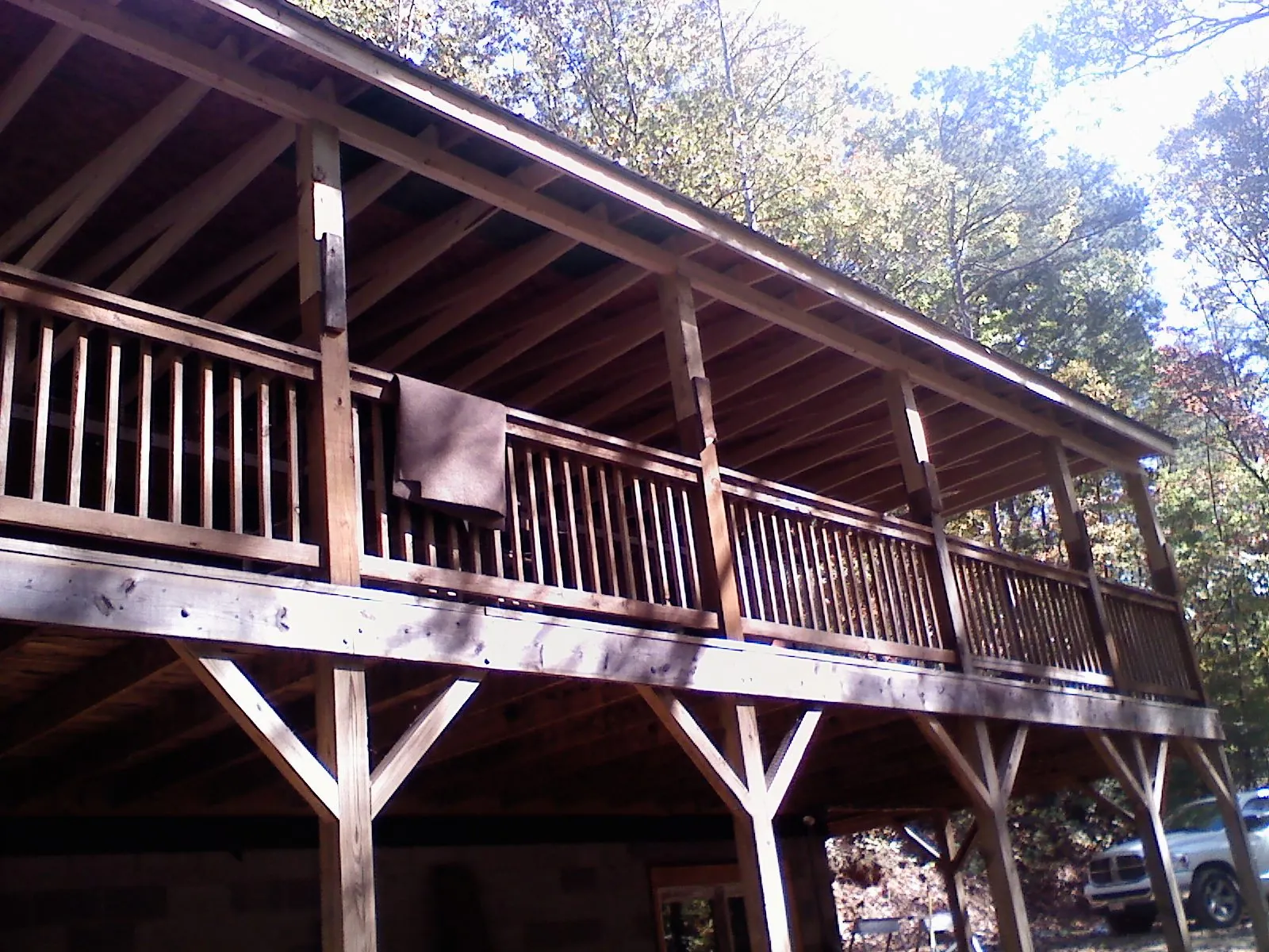 Timber framing under a new elevated porch and deck — Roof Leak Repair in Tussy by Roofing Brothers